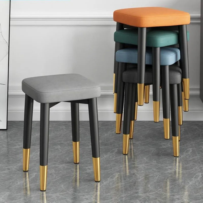 modern-cushioned-stool-for-dining-room-living-room-bedroom-and-office-with-golden-foot-cover-criss-cross-construction-leg